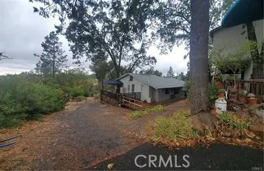 View from driveway of house with garage on right