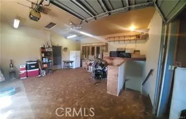 Bonus room/hobby area above garage