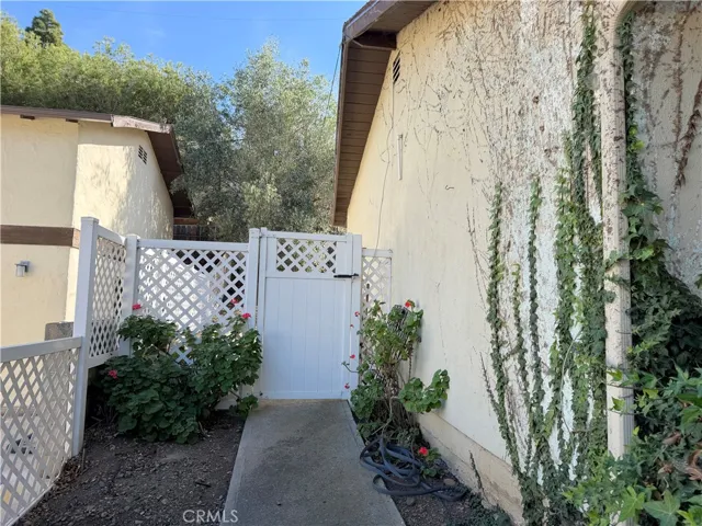Side walkway to backyard of House #2