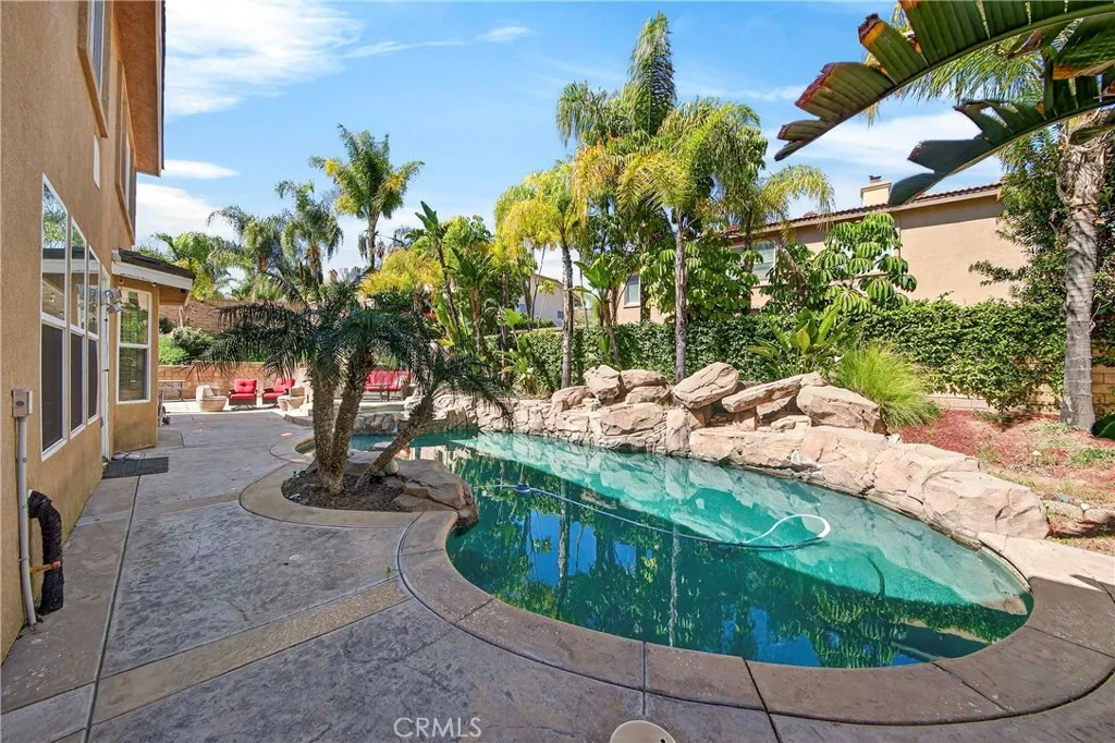 Paradise backyard with rock pool and spa