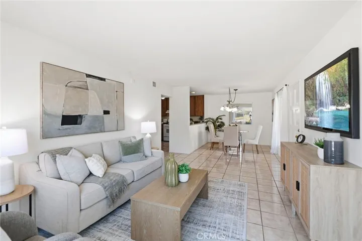 Entrance / Living Room / Dining Room ***Image on TV has been digitally added