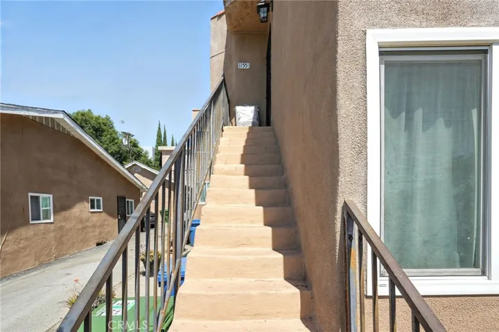 QUADPLEX UNIT #1 STAIRCASE TO UNIT
