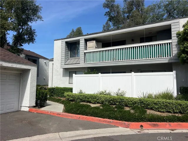 In a building with 2 other units, this is the subject with unit #82 on the 1st floor with the large patio and unit #83 on the 2nd floor with the expansive balcony.