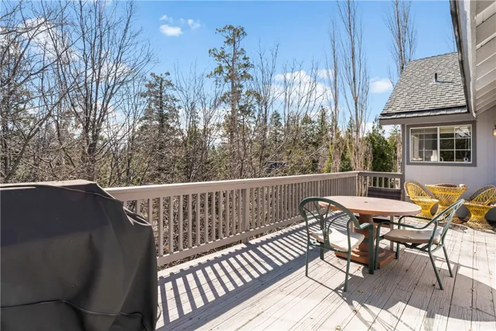 Main level deck with tree & ridgeline views
