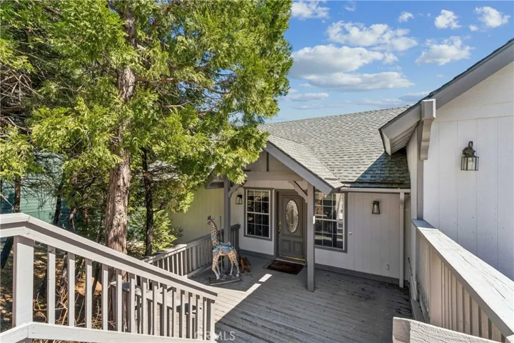 Easy stairs to large front porch into house