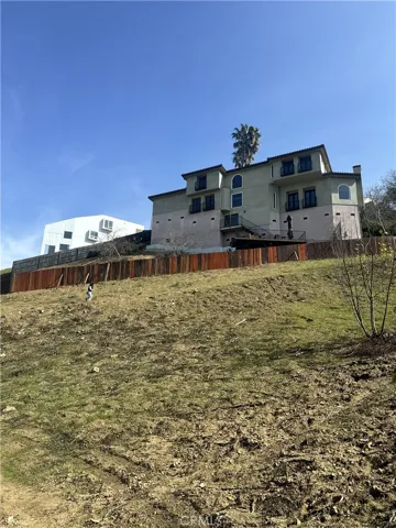 Rear view of the land, faces neighbors properties.