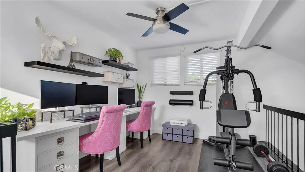 The 2nd bedroom is currently being used as an office and workout space. Ask us about our ideas for a guest room.