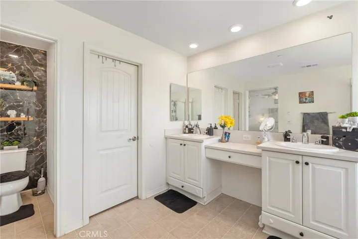 Upstairs main primary bathroom.