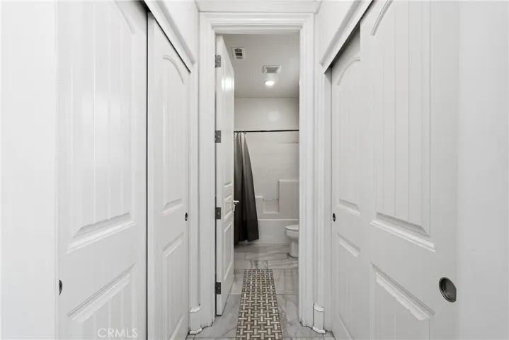 Main level Smaller primary bathroom.