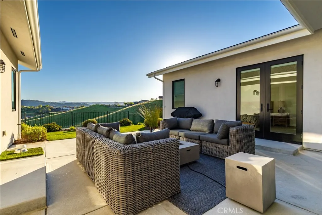 Home was designed that each wing and main living space open to this lovely patio area where you can gather and take in the beautiful views.