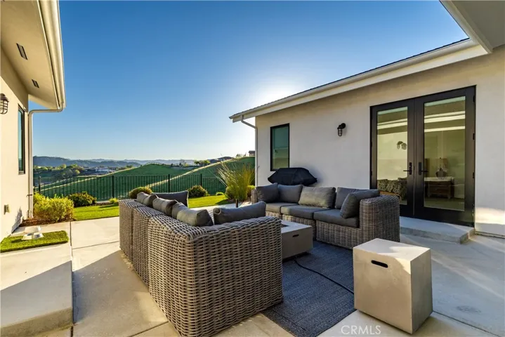Home was designed that each wing and main living space open to this lovely patio area where you can gather and take in the beautiful views.