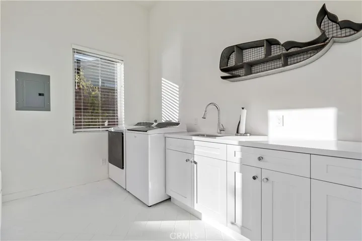 Huge laundry room there is a door to the left you don't see here that goes to side yard.