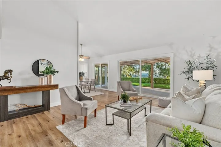 The family room is soaked in natural light