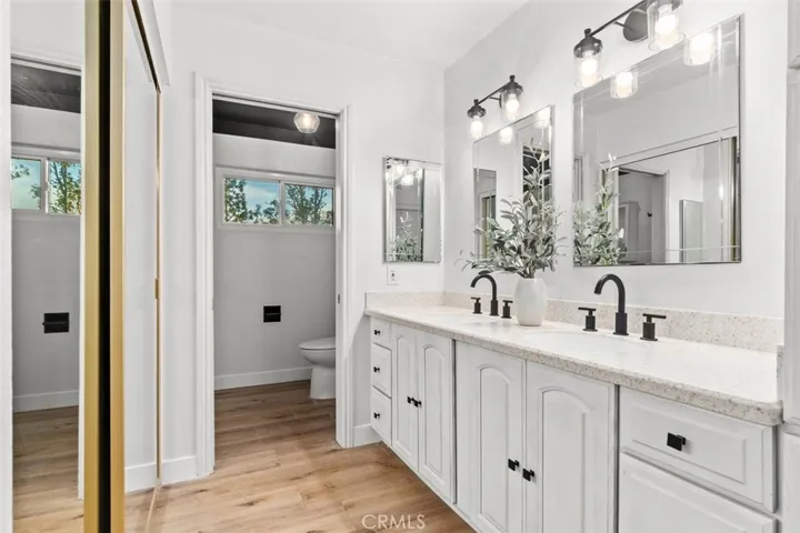 Primary bathroom offers double sinks