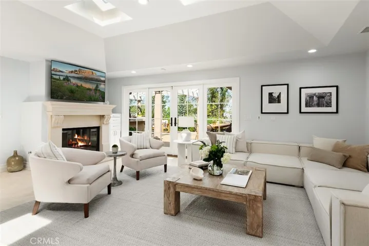 Family room flows to large entertaining patio