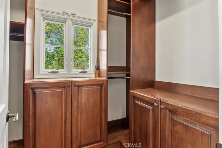 2 primary closets with custom built-in