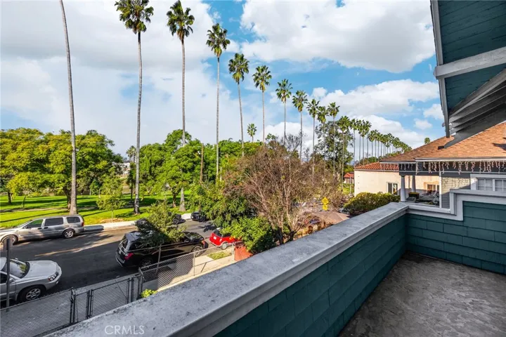Terrace off primary bedroom overlooking Park & Lake
