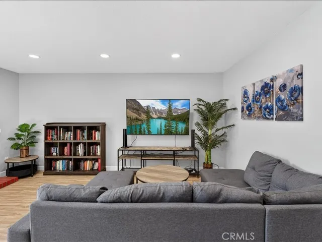 Bright and inviting living-room with abundant natural light -perfect for relaxing or entertaining