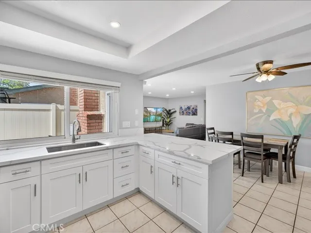 Brand-new kitchen featuring modern cabinetry, sleek finishes, and stainless-steel appliances