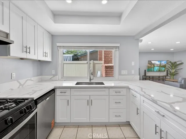 Brand-new kitchen featuring modern cabinetry, sleek finishes, and stainless-steel appliances