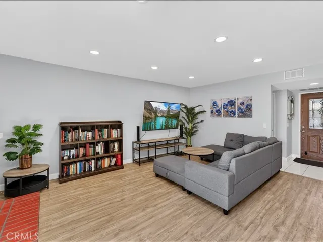 Bright and inviting living-room with abundant natural light -perfect for relaxing or entertaining