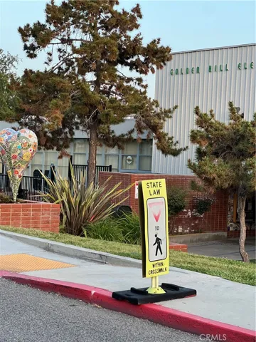 across from school