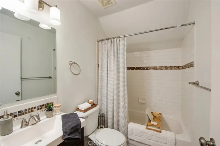 Virtually staged Upstairs Bathroom
