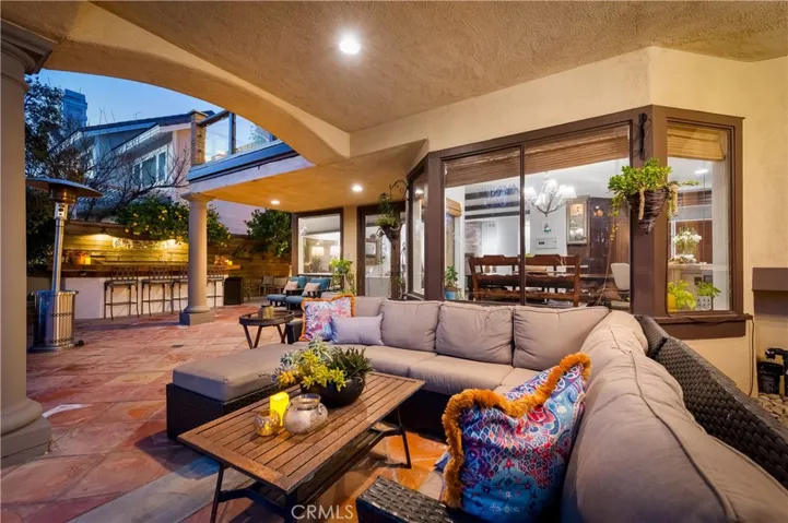 Coastal Living at its finest with multiple outdoor living spaces!