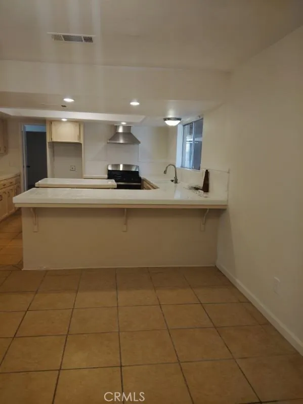 Large G- shaped kitchen