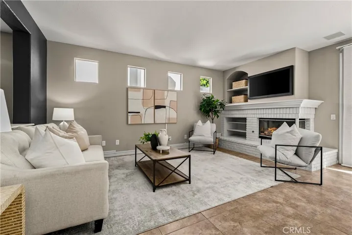Family room shot. Fire has been digitally added to the fireplace.