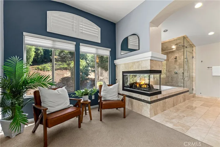 Looking into primary bath from retreat. Fire has been digitally added to firepalce