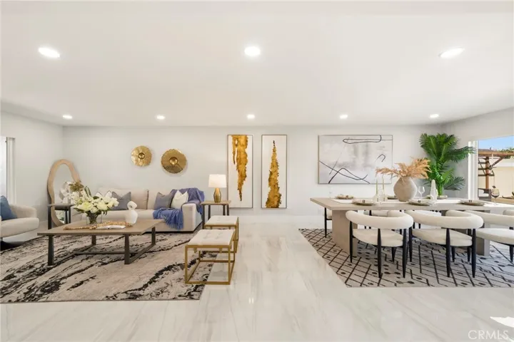Marble flooring throughout with dimmable recessed lighting