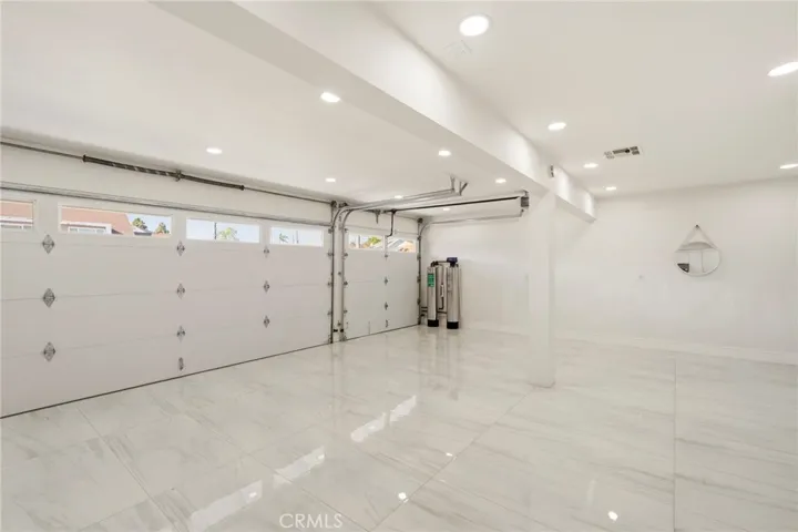 Water Softener located in the 3 Car-Garage