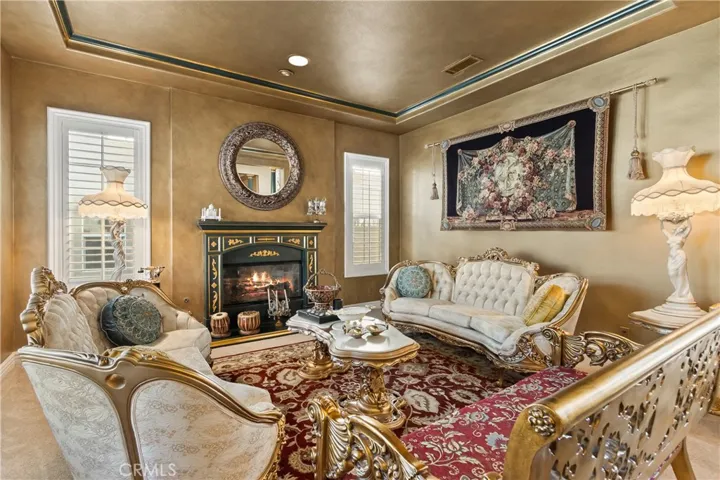Formal living room with fire place