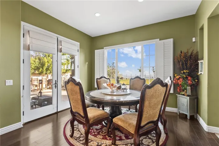 Breakfast nook with backyard pool views.