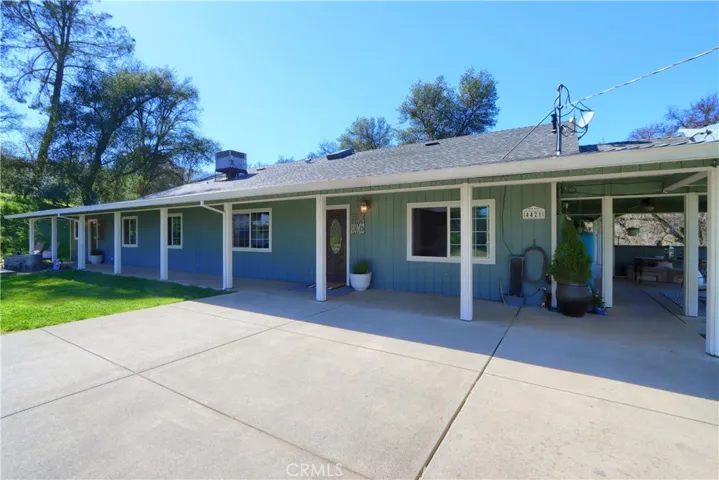 Covered Wrap Around Porch w/outdoor eating area.
