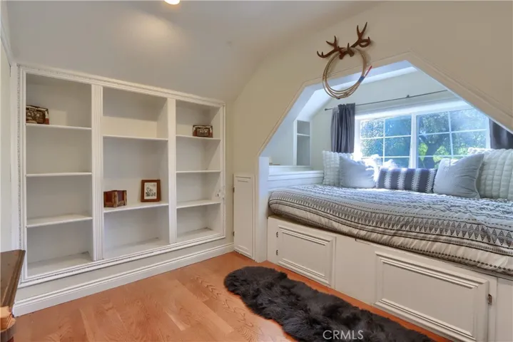 Built-in bed nook with built-in shelving/storage