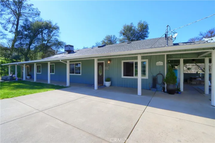 Covered Wrap Around Porch w/outdoor eating area.