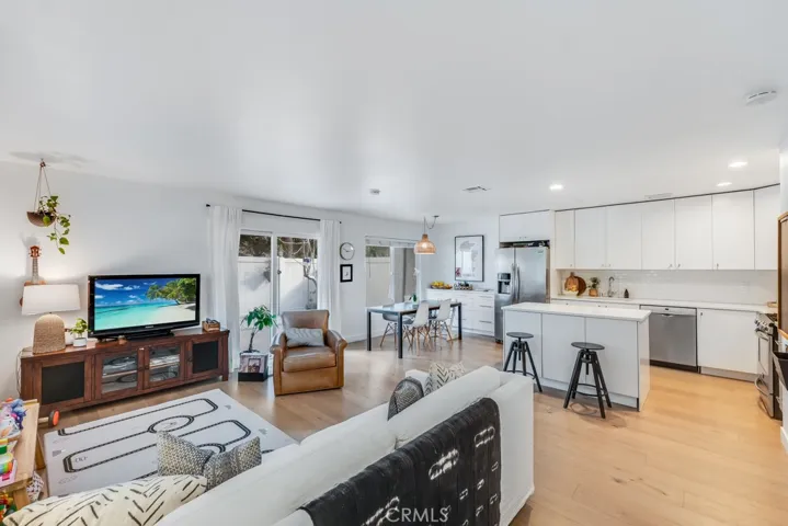 Living room open to kitchen and dining room