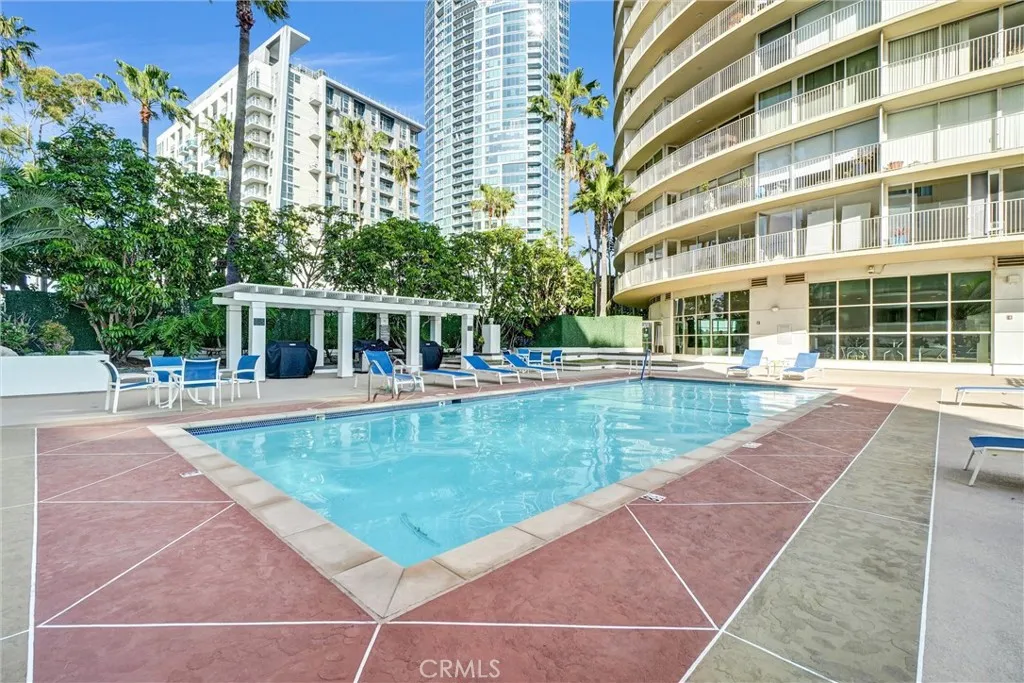 North-facing perspective overlooking the pool and BBQ area, ideal for hosting gatherings.
