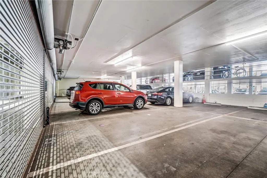 xclusive tandem parking for two cars (Space 93), complete with a private garage door opener for secure, effortless access.