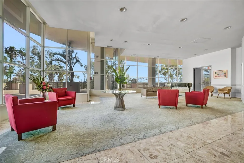 Elegant lobby featuring a grand piano and a serene atmosphere, ideal for relaxing and taking in the views.