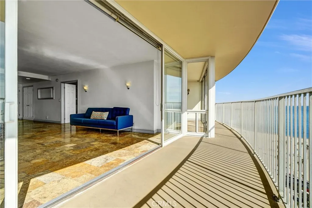 East-facing balcony opening from the living room, offering serene views.