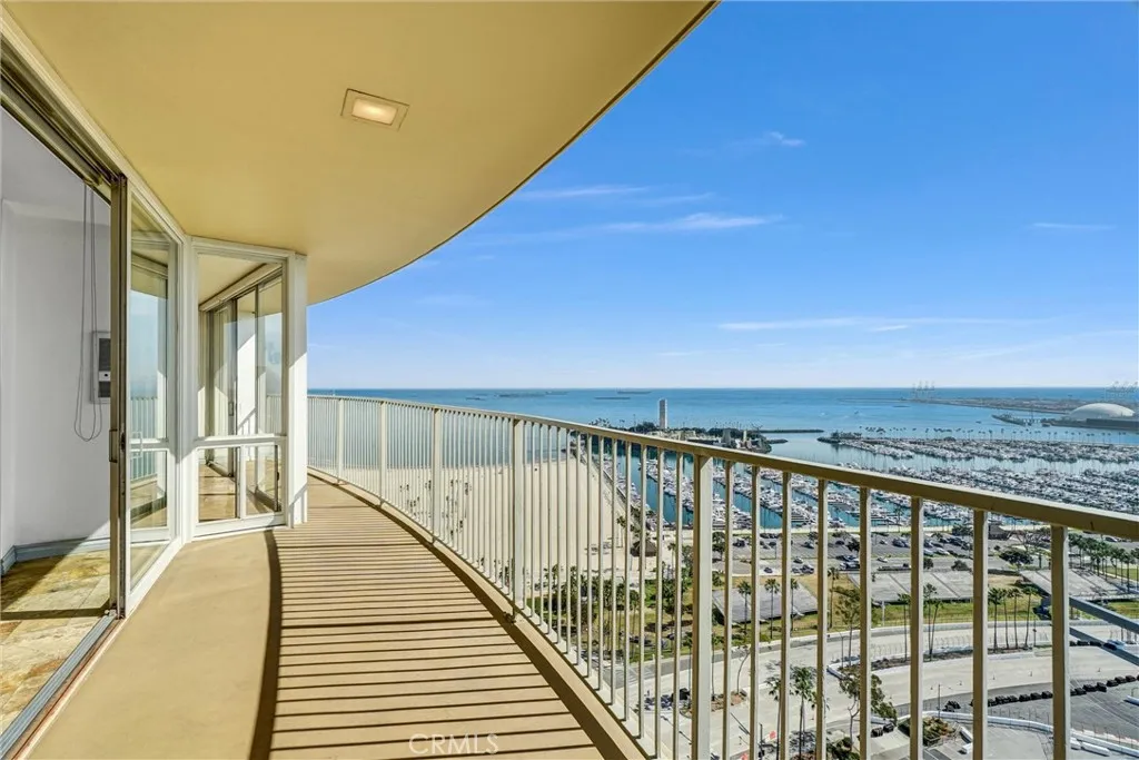 Spacious curved balcony offering breathtaking east-facing panoramas.
