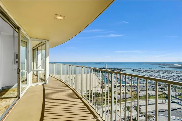 Spacious curved balcony offering breathtaking east-facing panoramas.