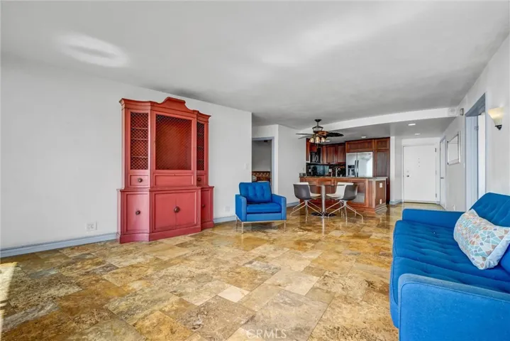 North-facing view from the living room toward the entrance door and kitchen.