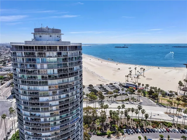 East-facing aerial view of 700 Ocean Tower with breathtaking views of the Pacific Ocean and nearby beaches.