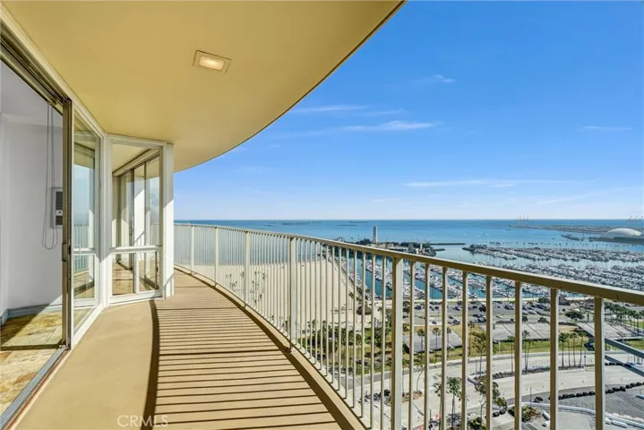 Spacious curved balcony offering breathtaking east-facing panoramas.