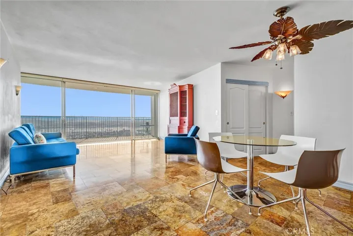 Living room offering stunning 180-degree panoramic ocean views.