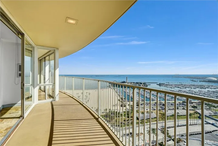 Spacious curved balcony offering breathtaking east-facing panoramas.